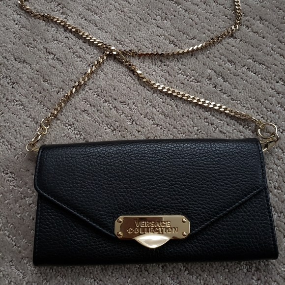 Versace Handbags - Versace wallet on a chain black leather clutch